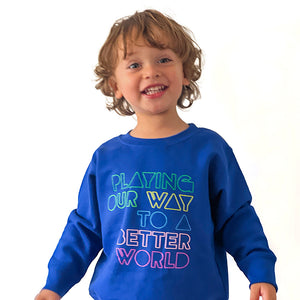 CAYTON KIDS SWEATSHIRT:  PLAYING OUR WAY TO A BETTER WORLD